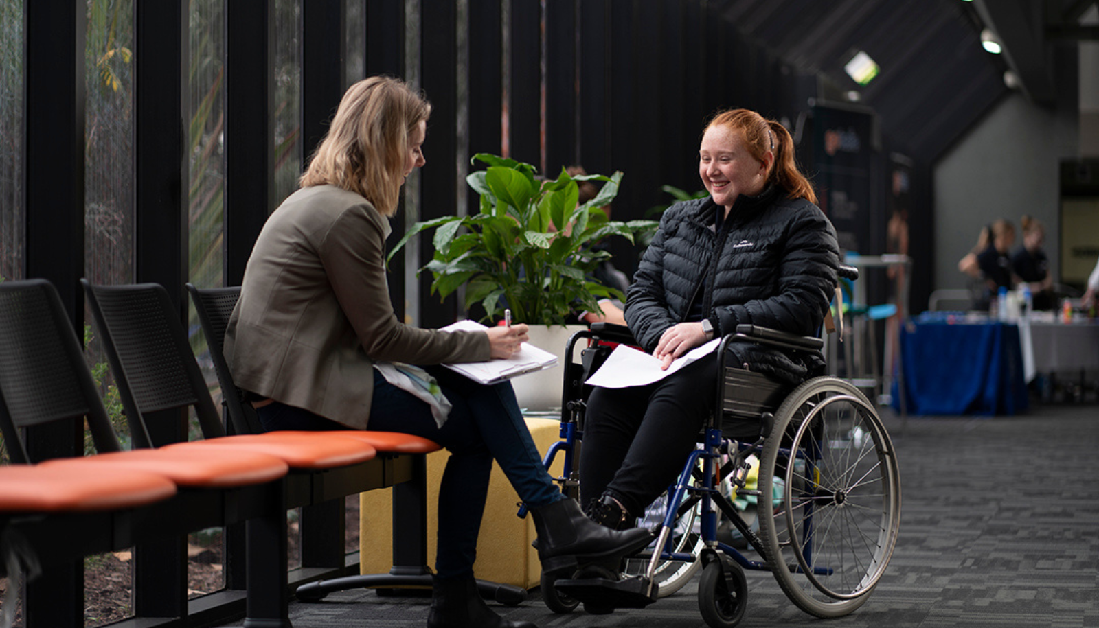 Two women having a conversation at the GOTAFE campus