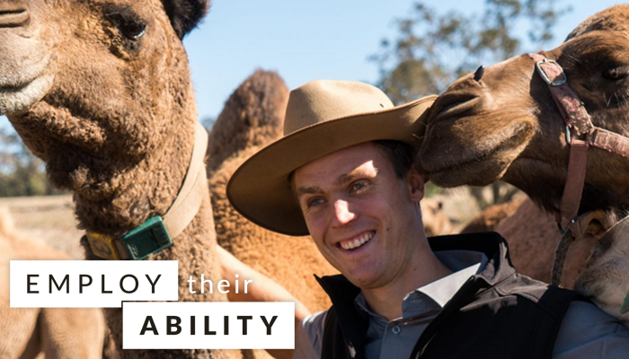 Max Bergmann with his camels at their camel farm in Morangup, Western Australia (Source: Drome Dairy)